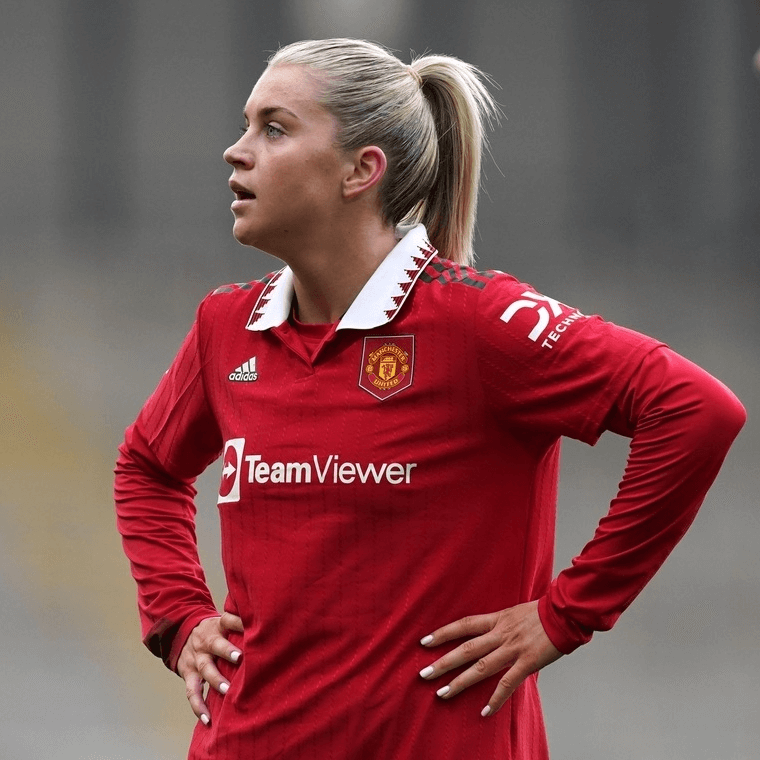 England striker Ella Toone takes a breather during a Manchester United game - football4football